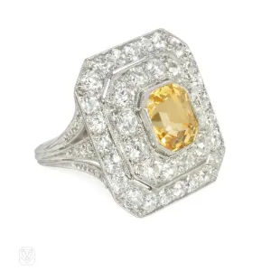 1920s yellow sapphire, diamond, and platinum target ring