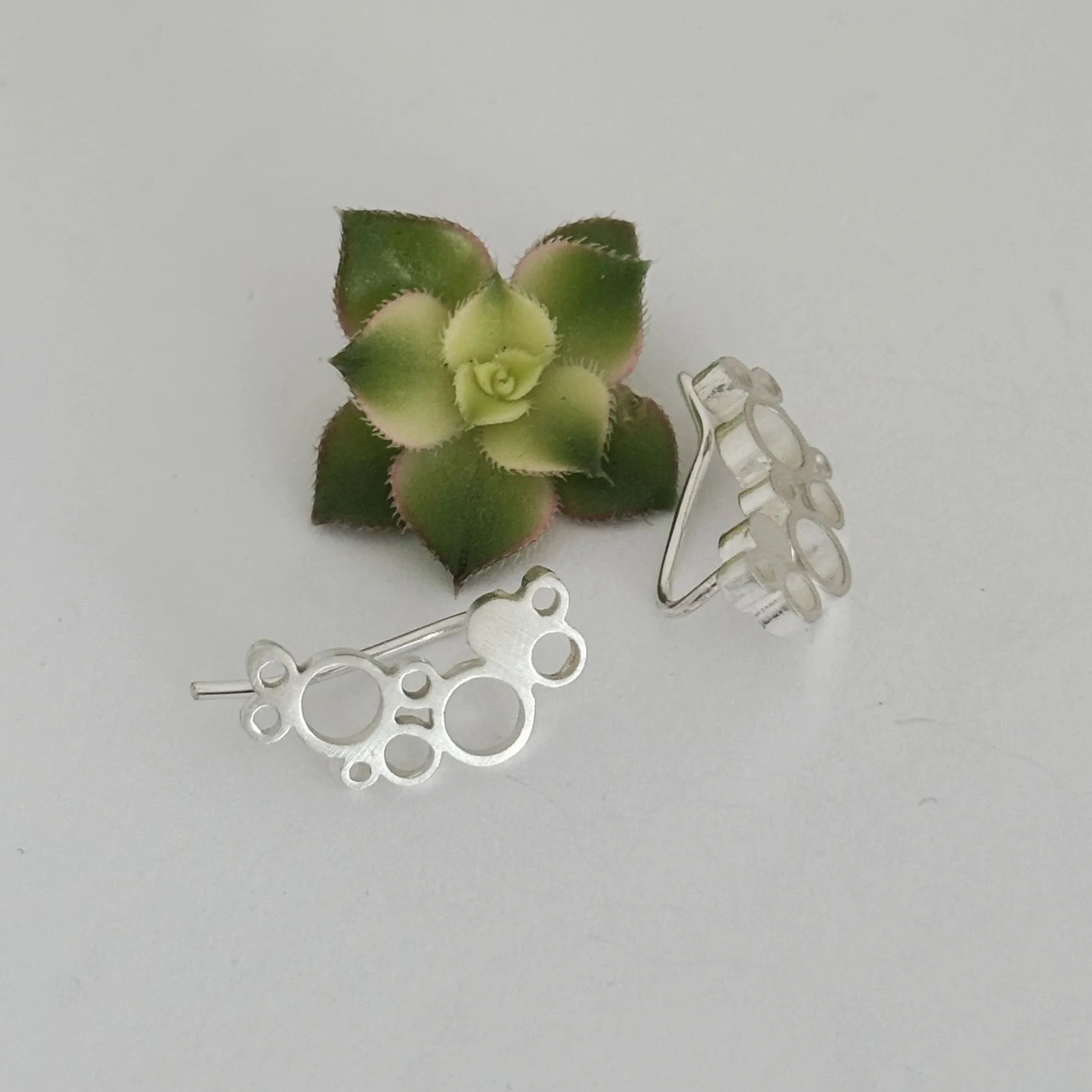 Dot Holly silver climber earrings